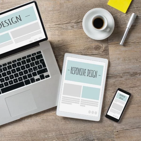 Rendering Responsive Design. A website is displayed on a laptop, a tablet and a smartphone